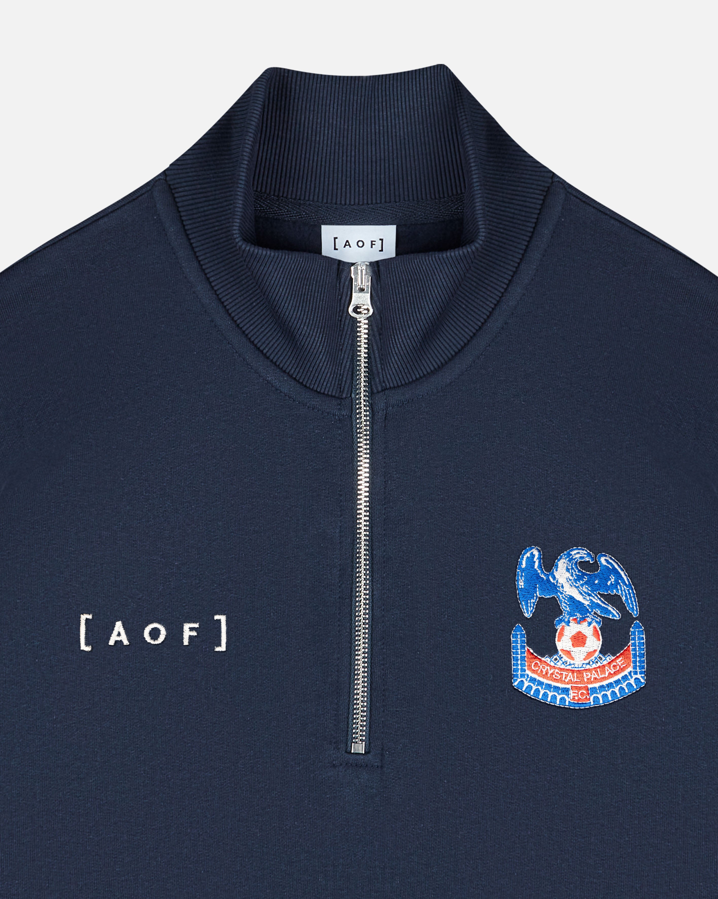 AOF x Crystal Palace 90s Quarter Zip Sweat | Navy Jersey | Shop Now